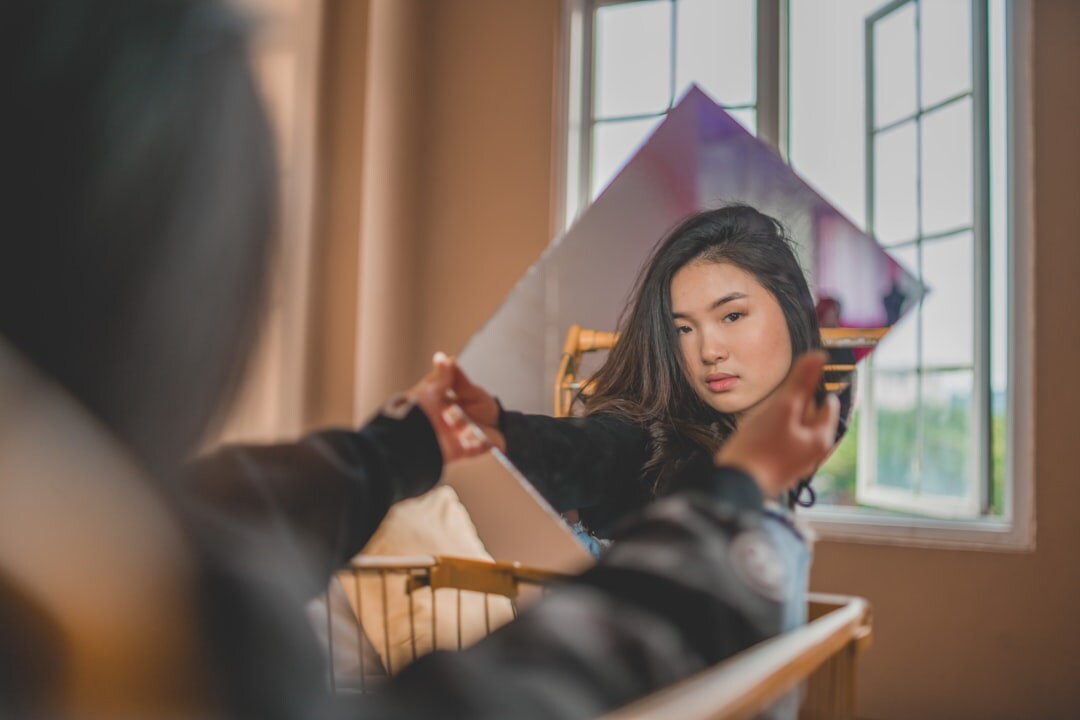 woman practicing speech mirror